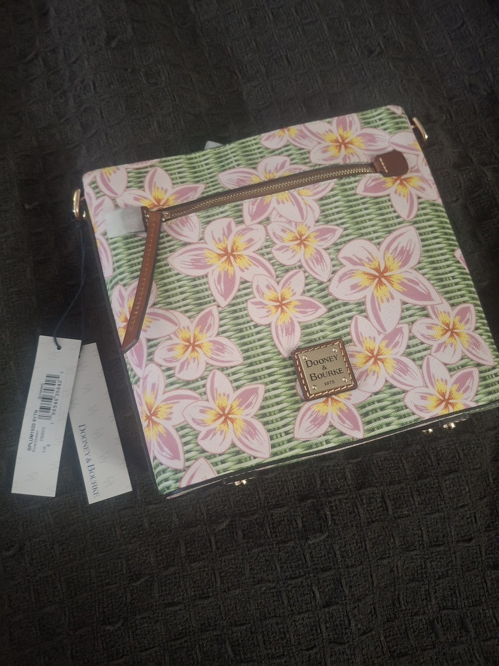 Dooney & Bourke Pink Floral Crossbody with Green Background